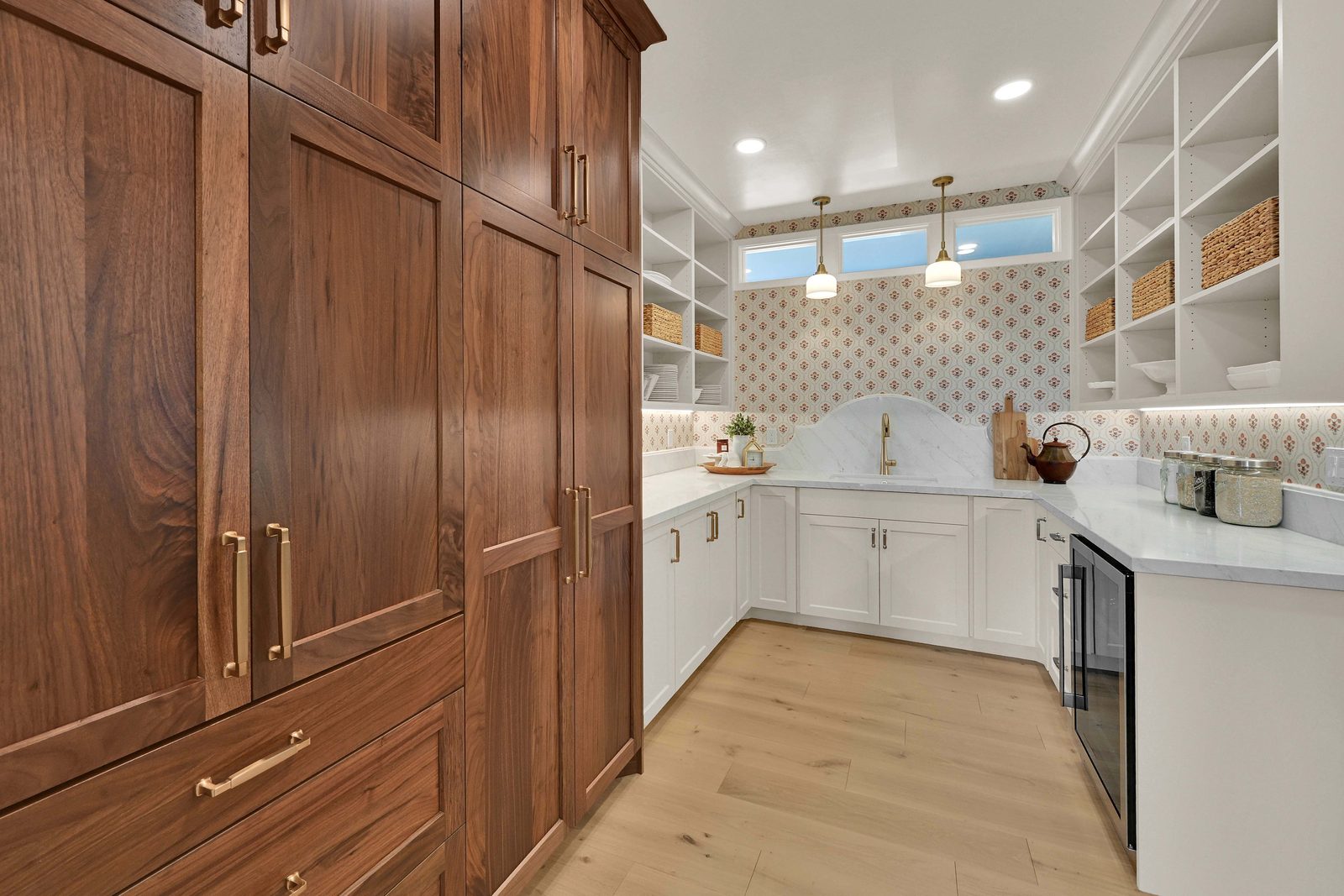 North of Creekside butler’s pantry with walnut cabinetry, 2026 Top of Utah Parade of Homes