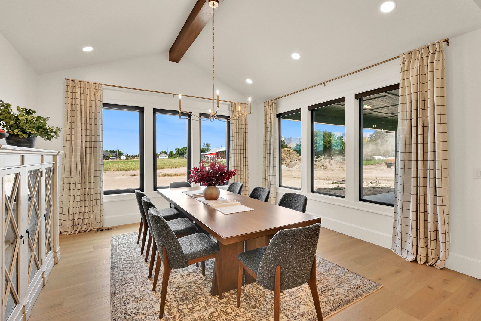 North of Creekside dining room with vaulted beam ceiling, 2026 Top of Utah Parade of Homes