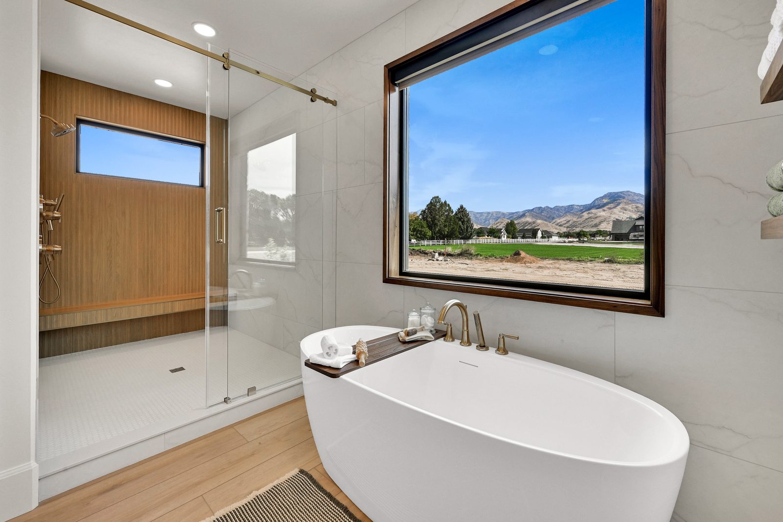 North of Creekside primary bathroom with freestanding tub and walk-in shower, 2026 Top of Utah Parade of Homes