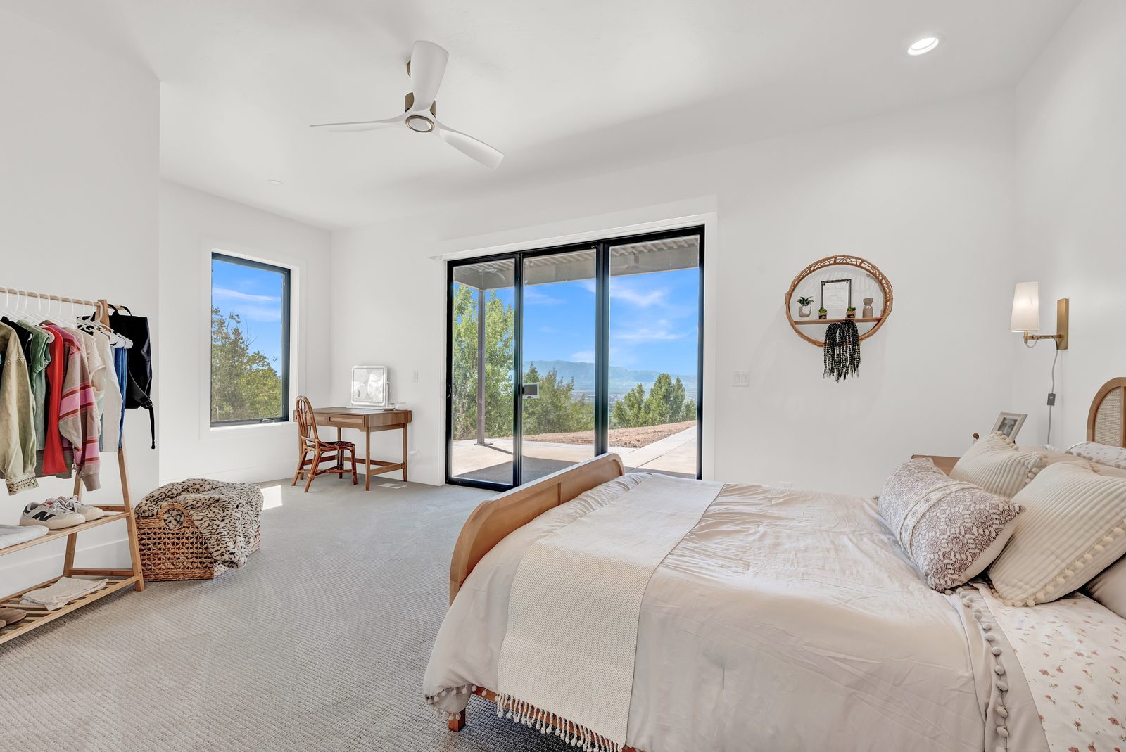 Valley View Estate bedroom with sliding glass door to patio, 2023 Top of Utah Parade of Homes