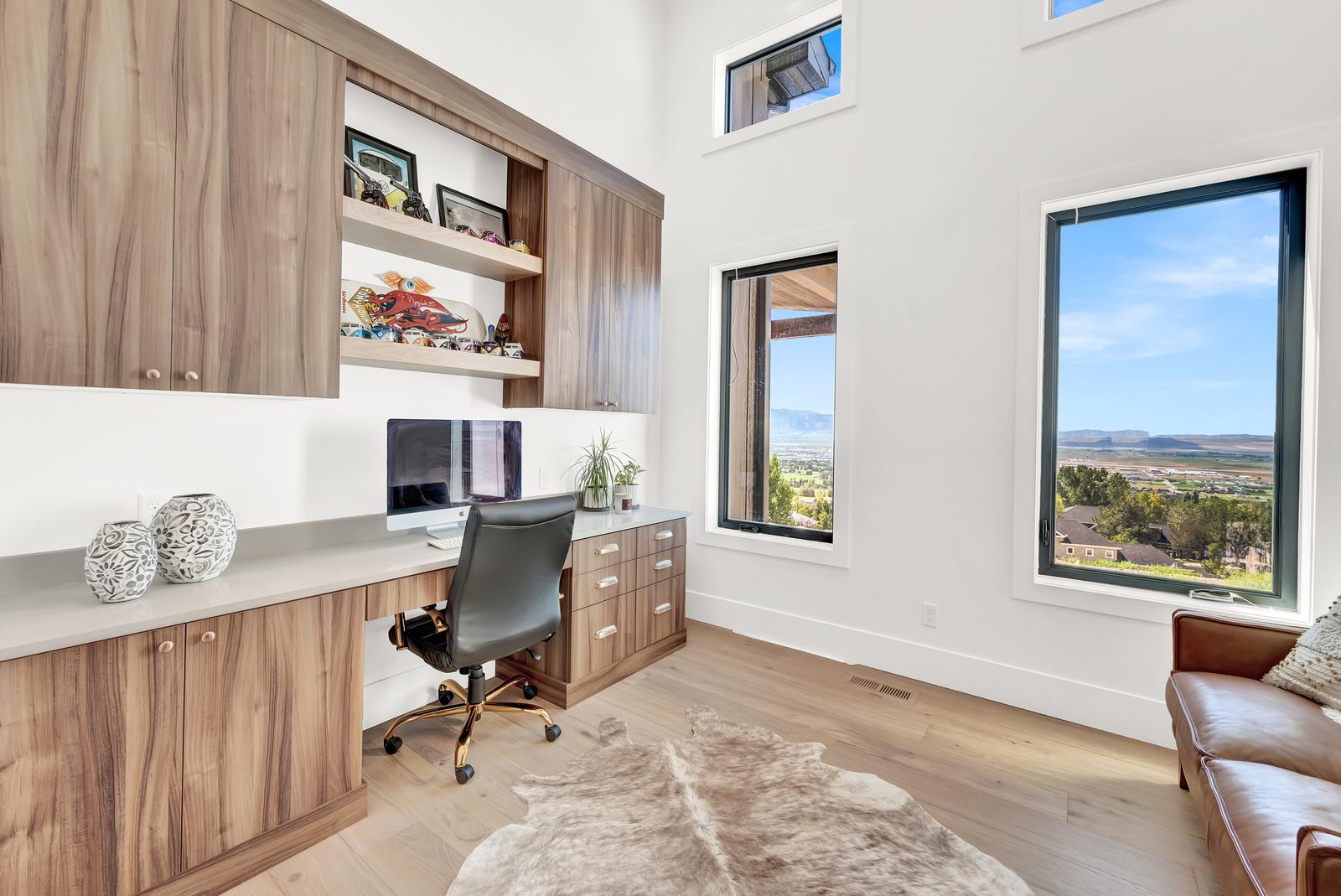 Valley View Estate home office with built-in desk and cabinetry, 2023 Top of Utah Parade of Homes
